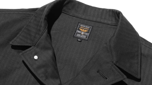 待望の新色「ブラック・ヘリンボーン」が登場──CM43 HBT Field Jacket